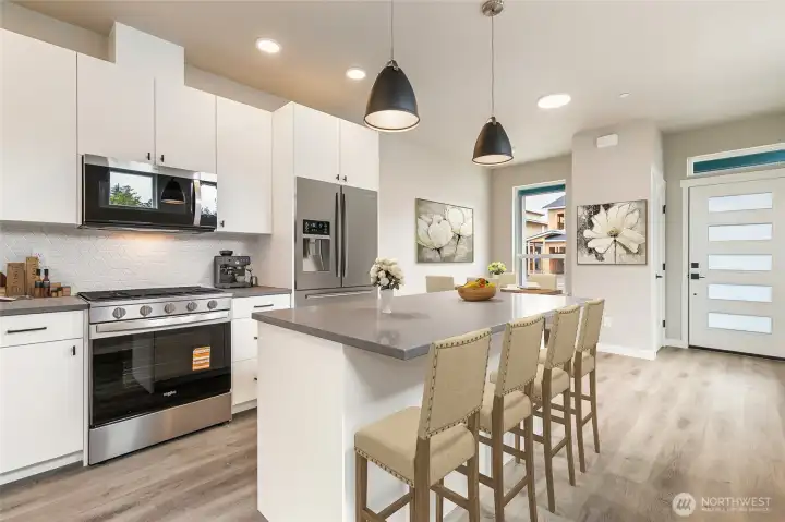 Kitchen, staged photo of a different unit but the same Peaks model for reference only.