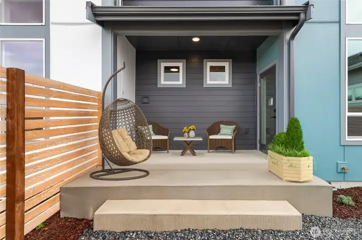 Back patio, staged photo of a different unit but the same Peaks model for reference only.