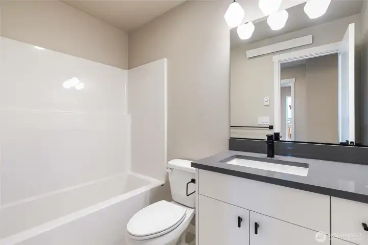 Bathroom pic for reference of like unit. 555 Northview is under construction.