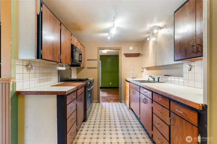 Both living rooms have access to the kitchen