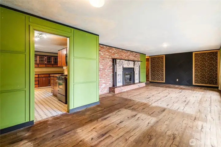 Another angle of the living room that also peeks into the kitchen