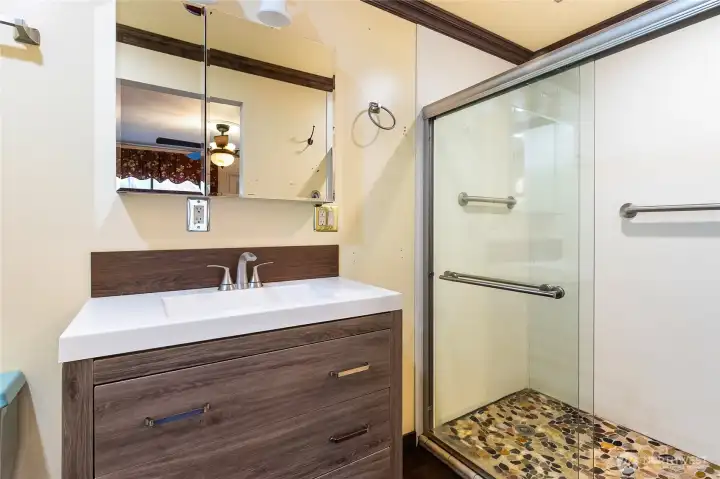 3/4 bath off bedroom in old garage/living area