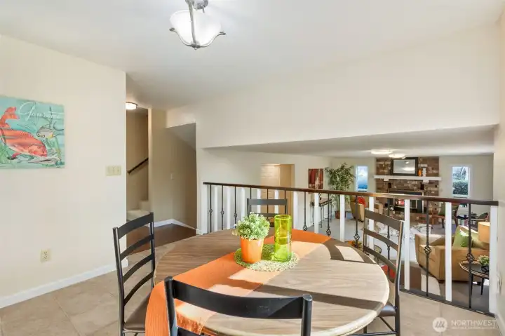 The generous kitchen eating space accommodates many daily dinning table