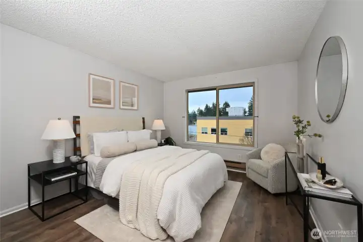 Western views from both bedrooms of sunsets, the Olympic Mtns and a peek at the Puget Sound.