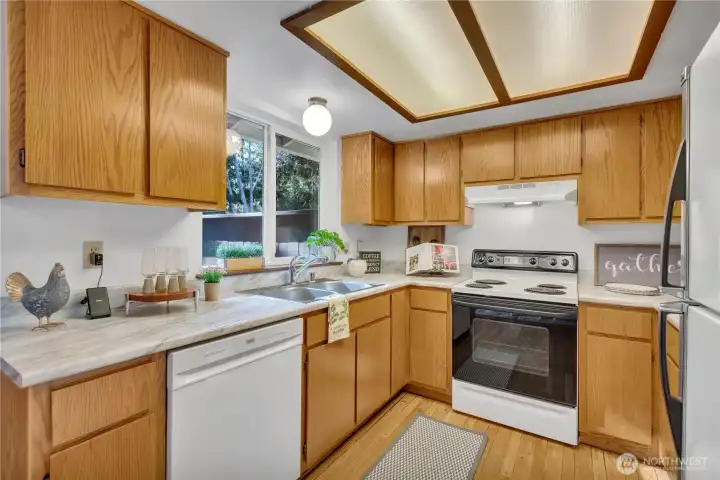 Kitchen features newer appliances and overlooks Green Space