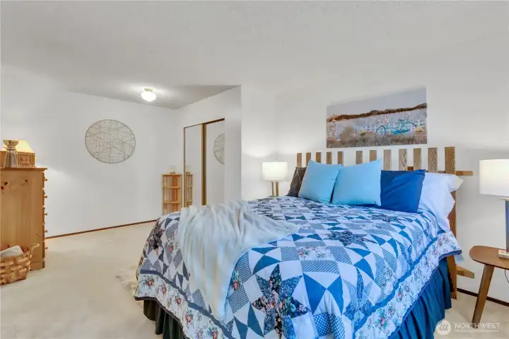 Oversized 3rd bedroom on lower level features a sitting area