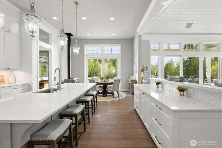 Absolutely Breathtaking Kitchen w/ Slider and Soap Stone Wood Stove. Two Islands