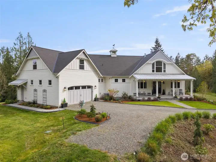 2 Car attached garage and a 6 car garage below. Perfect for the car enthusiast, farm and recreational vehicles. Maybe a small business?