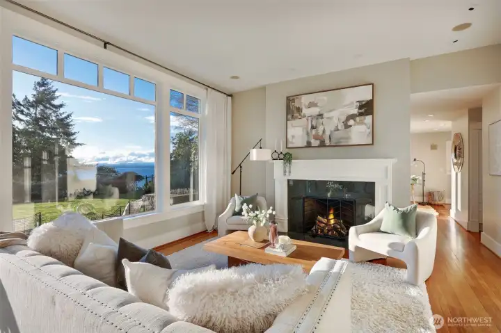 Big picture window for views and light plus a cozy FP that is plumbed for a gas insert