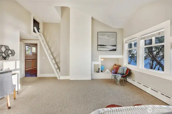 The nooks and ladders to lofts continue; it's a playful home