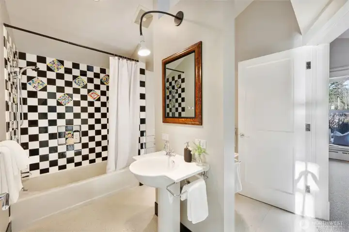 A "Jack and Jill" full bath connects the two bedrooms