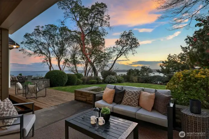 Let's head back upstairs and tour the back yard that offers plenty of living and dining spaces