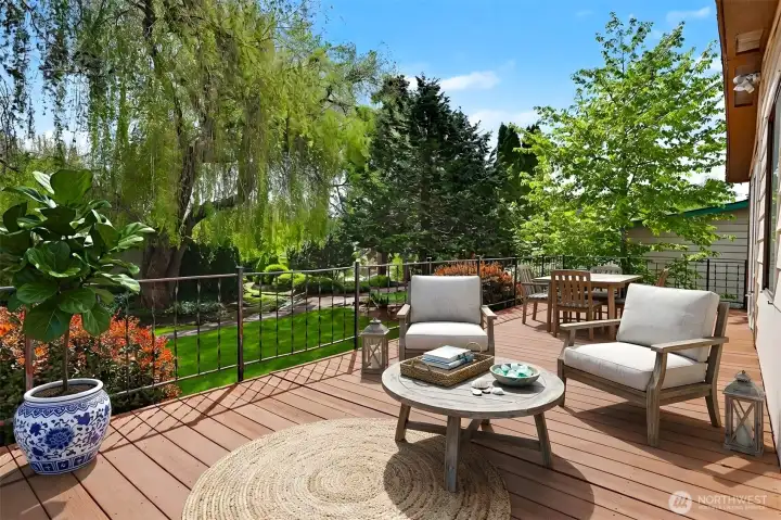Wrap around deck on the south side with Lake Views, borders the community greenbelt, trail and creek.