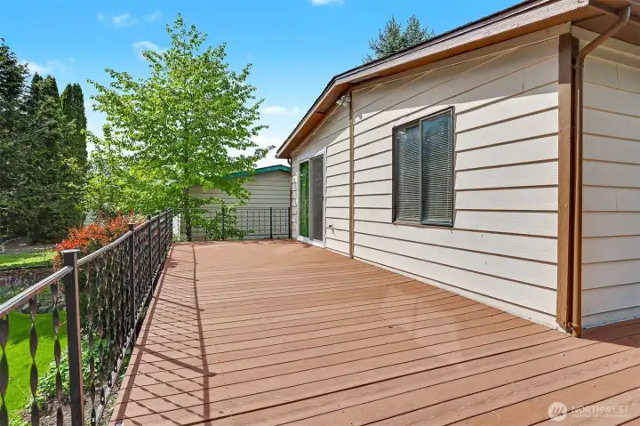 Wrap around deck on the south side with Lake Views, borders the community greenbelt, trail and creek.