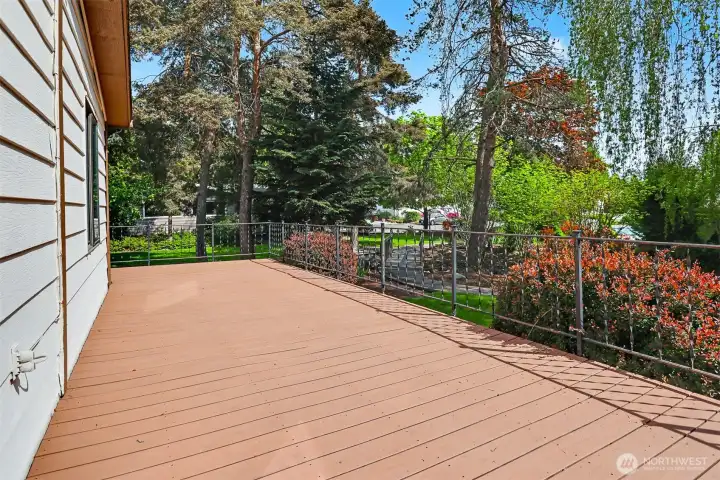 Wrap around deck on the south side with Lake Views, borders the community greenbelt, trail and creek.