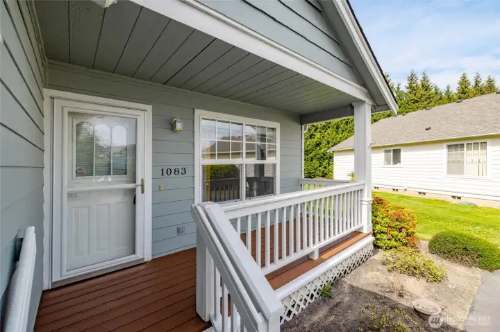 Nice covered front porch area to enjoy warm summer days!