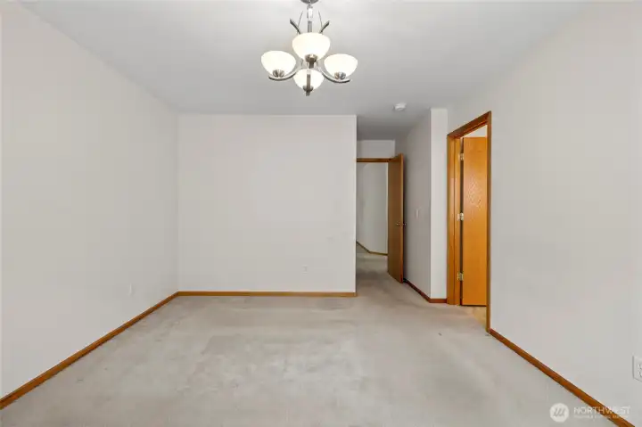 Another view of the primary bedroom