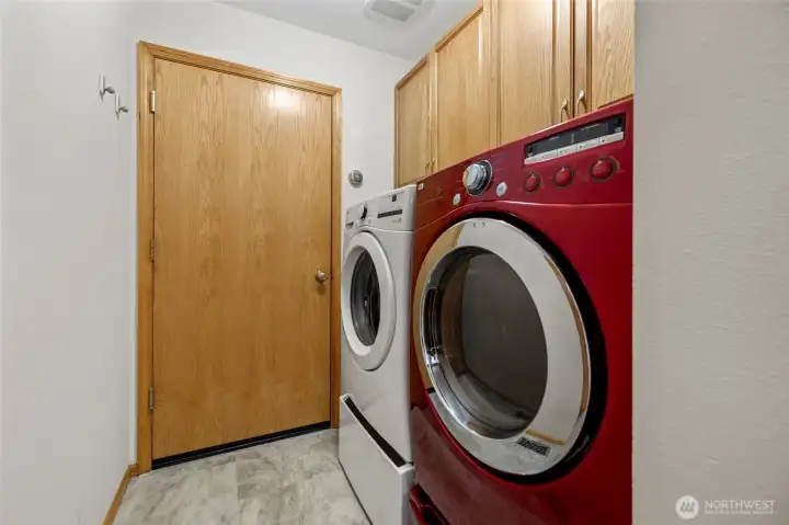 Laundry room with entry to garage