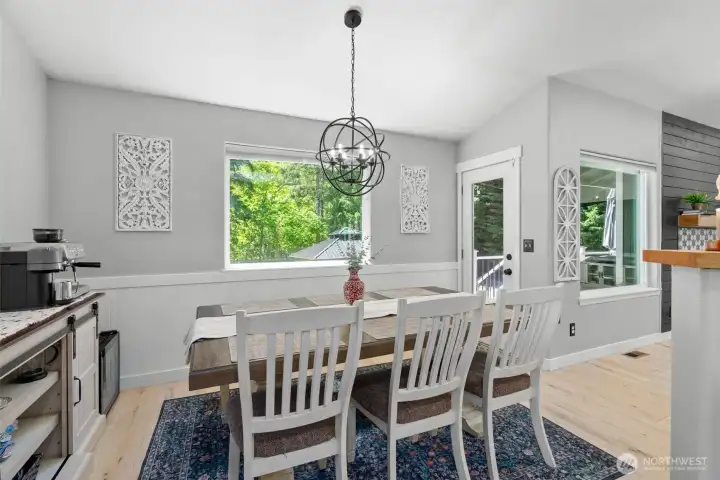 Windows and door to the backyard bring in light and make entertaining easy