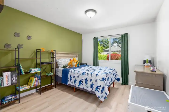 Bedroom 3 is roomy with a front-yard view