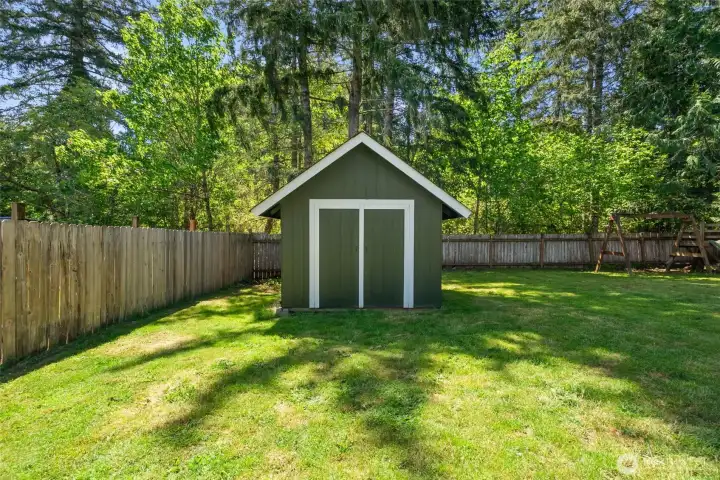 Shed offers extra storage of outdoor and garden tools and toys.