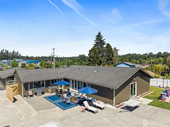App-enabled smart home features including garage doors, HVAC (heating & air conditioning), security system, and select lighting in the kitchen, living room, primary bedroom, and front exterior. Perfect for large gatherings of all ages and showcases exceptional indoor-outdoor flow