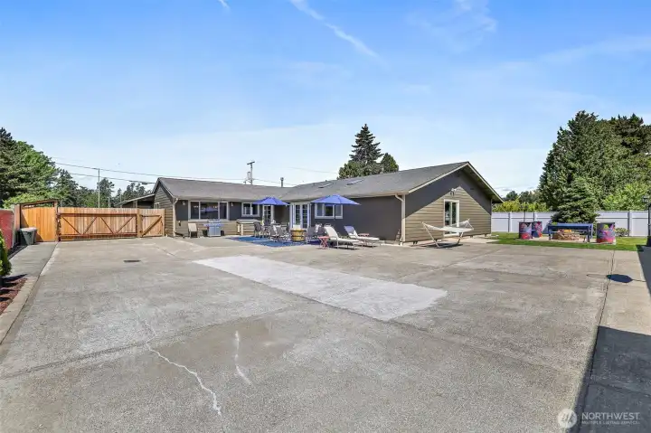 Oversized Gate to allow vehicle access to rear garages. Ample of On-Site Parking for 20+ cars. Gated access for privacy.
