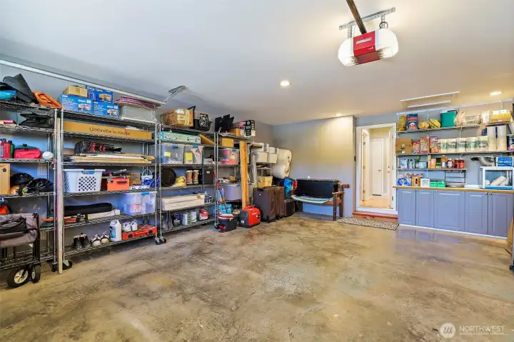 Spacious 2 car attached garage in front of the house.