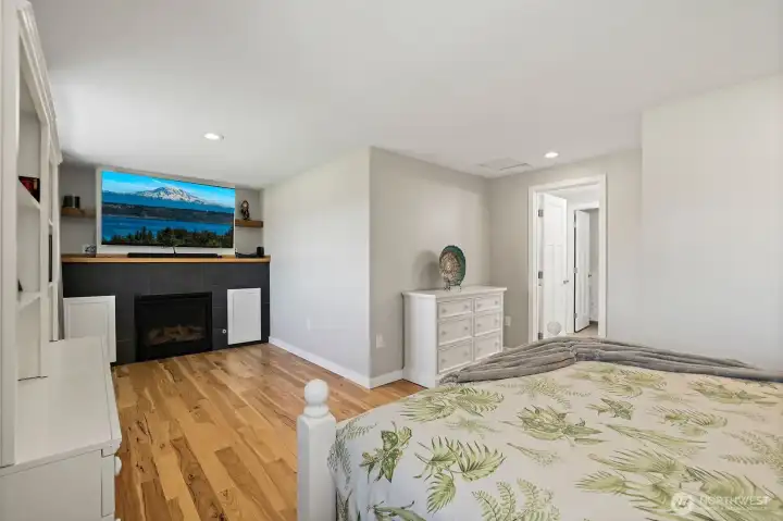 Expansive Primary suite with TV & gas fireplace