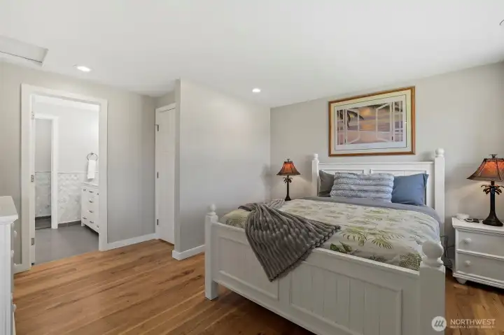 Luxury doorless walk-in show with dual (optional handheld) shower system in primary suite;
