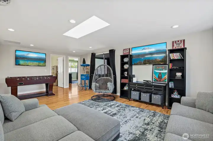 Host your own dance party! The family /game room comes with fun sound-activated LED party light ball (stays with house) and electrical outlets to add more. Skylights.
