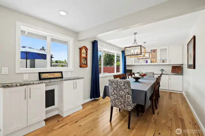 Separate Dinning Room. Custom Built-in cabinetry in dinning room, living room, kitchen pantry and laundry room.
