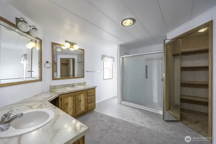 Dual Vanities, a Step-in Shower, and more closet space.