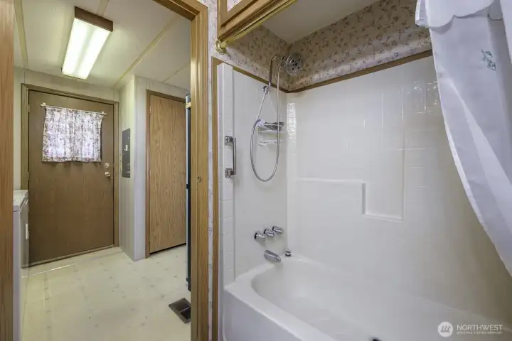 Guest Bath features a tub.