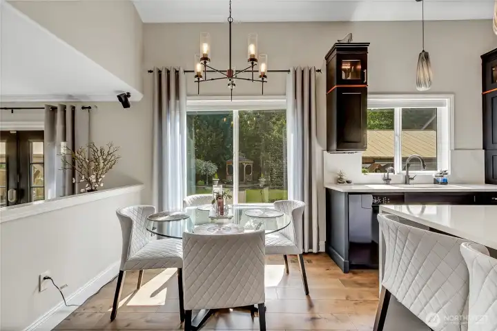 Spacious eat-in dining area that opens seamlessly to the family room & provides comfortable everyday dining with views of the backyard. Spacious eat-in dining area that opens seamlessly to the family room & provides comfortable everyday dining with views of the backyard.