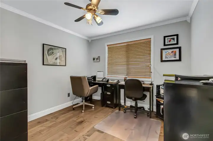 Versatile main floor den with closet offers the flexibility to serve as a home office, guest room or potential 4th bedroom. Versatile main floor den with closet offers the flexibility to serve as a home office, guest room or potential 4th bedroom.