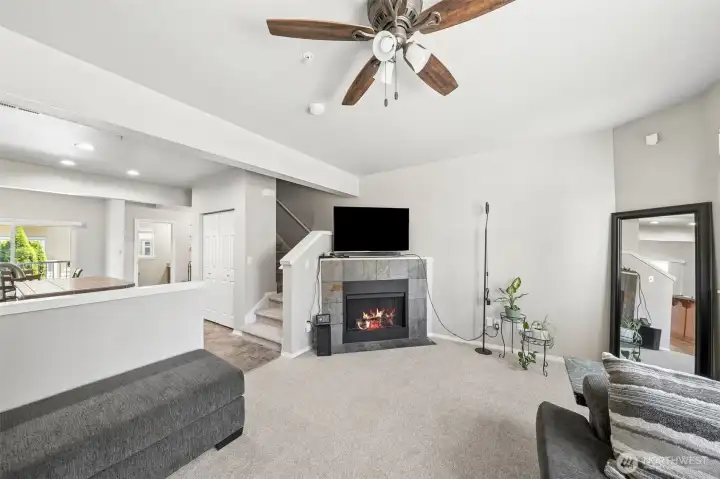 Open floorplan... Family room with firelplace adjacent to Kitchen.