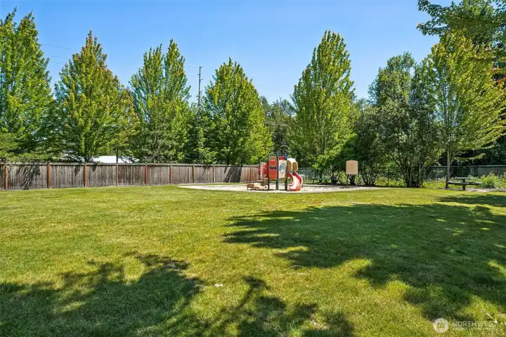 Park and open area at entrance of community.