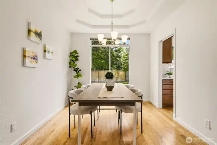 Dining area positioned for easy access to the kitchen and living spaces, creating a functional setting for daily meals and special occasions. Dining area positioned for easy access to the kitchen and living spaces, creating a functional setting for daily meals and special occasions.