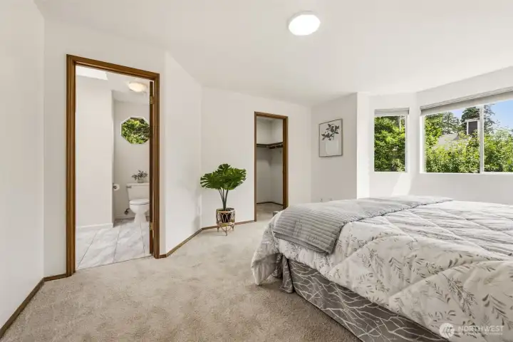 Spacious primary suite featuring abundant natural light, generous proportions, and walk in closet. Spacious primary suite featuring abundant natural light, generous proportions, and walk in closet.