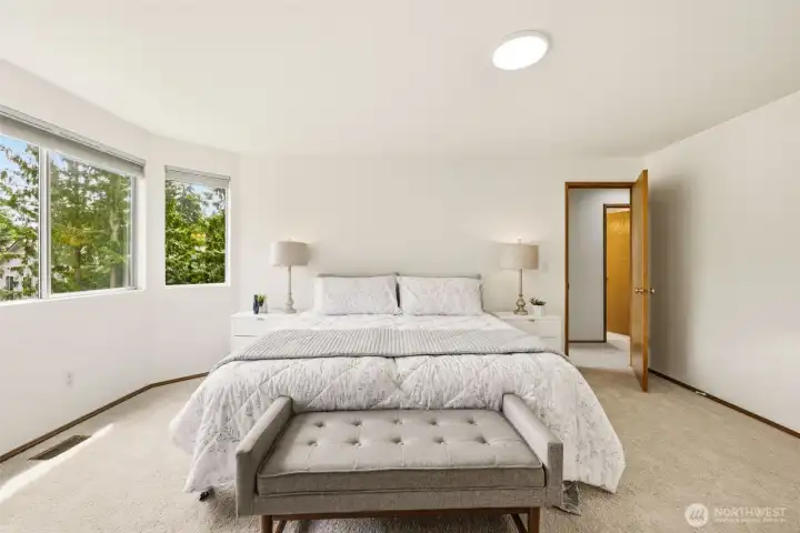 Another view of the primary bedroom highlighting generous dimensions and a functional layout. Another view of the primary bedroom highlighting generous dimensions and a functional layout.