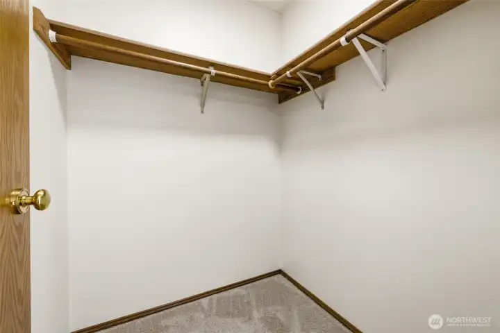 Walk in closet providing valuable storage space and organization for clothing, seasonal items, and personal belongings. Walk in closet providing valuable storage space and organization for clothing, seasonal items, and personal belongings.