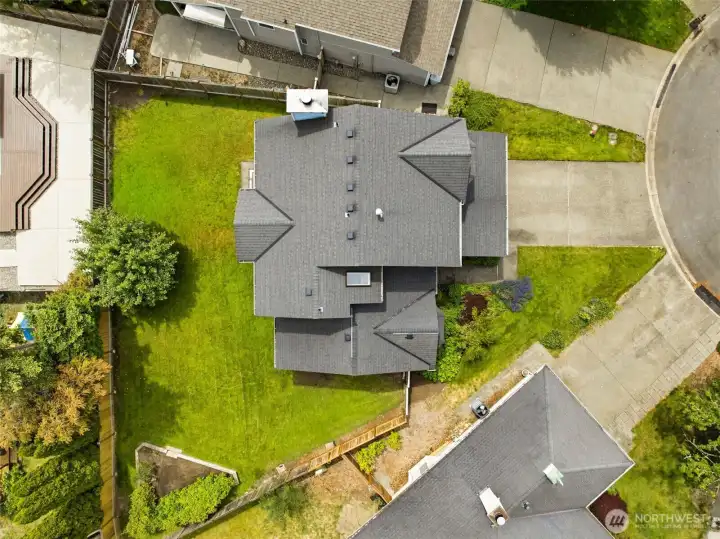 Aerial view of the property illustrating the home's footprint, yard size, and relationship to neighboring homes. Aerial view of the property illustrating the home's footprint, yard size, and relationship to neighboring homes.