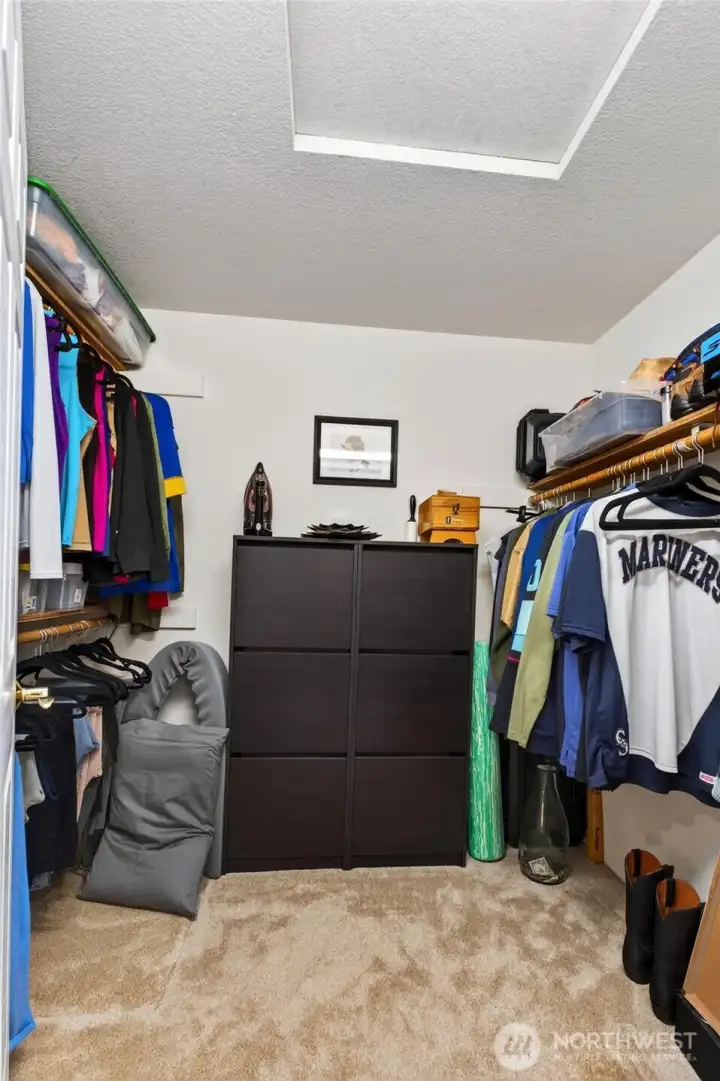 Primary Walk-in Closet Primary Walk-in Closet