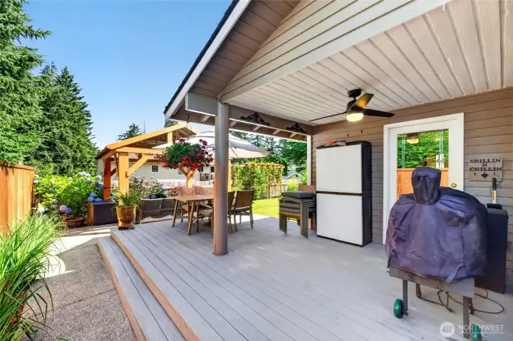 Inviting back deck, partially covered Inviting back deck, partially covered
