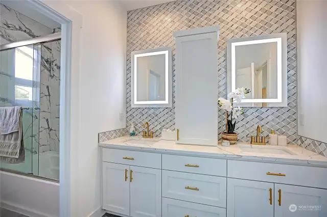 Guest Bathroom also features Radiant Tile and Powered Dual Vanities~