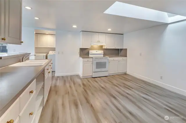 View of kitchen towards laundry room and additional bathroom