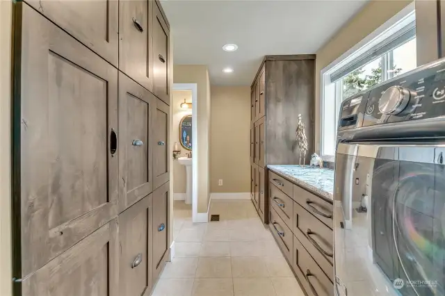 Large Laundry Room with Plenty of Cabinets