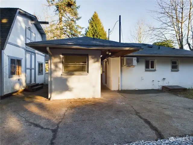 Back of Utility Room and 2 story storage shed