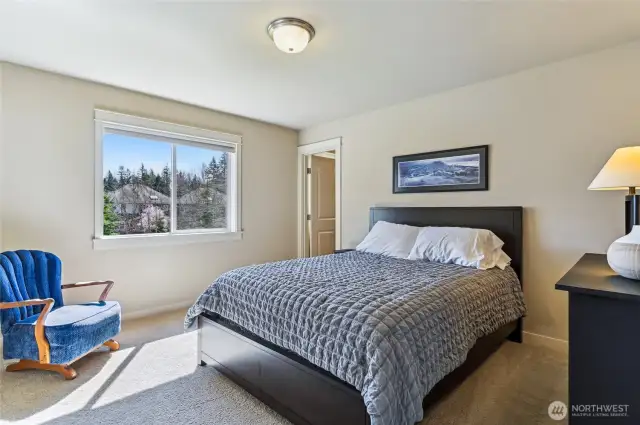 The second upstairs bedroom has an attached 3/4 bathroom.